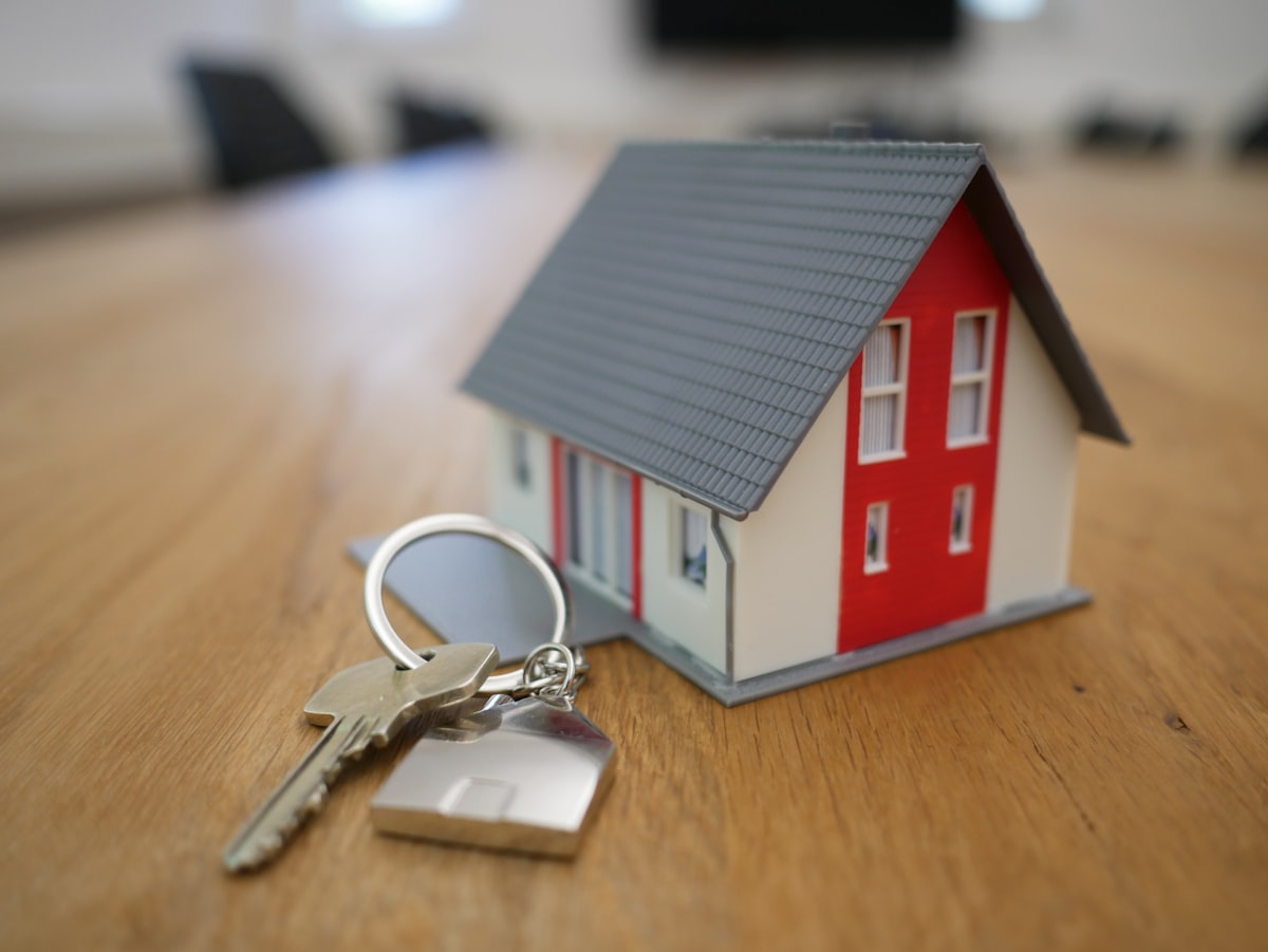House keys resting on a residential property document
